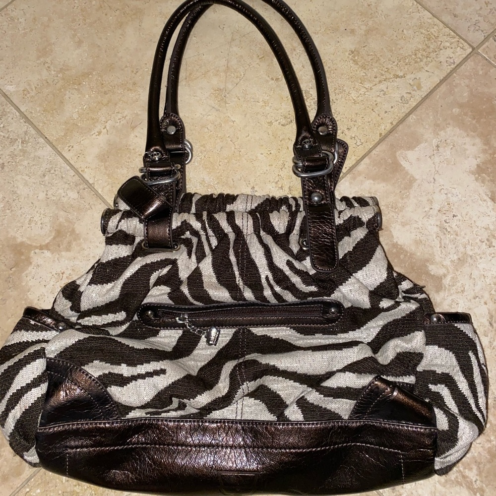 Kathy Van Zeeland zebra print blue purse